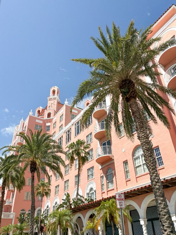 Historic pink hotel and palm trees on St. Pete Beach, Florida