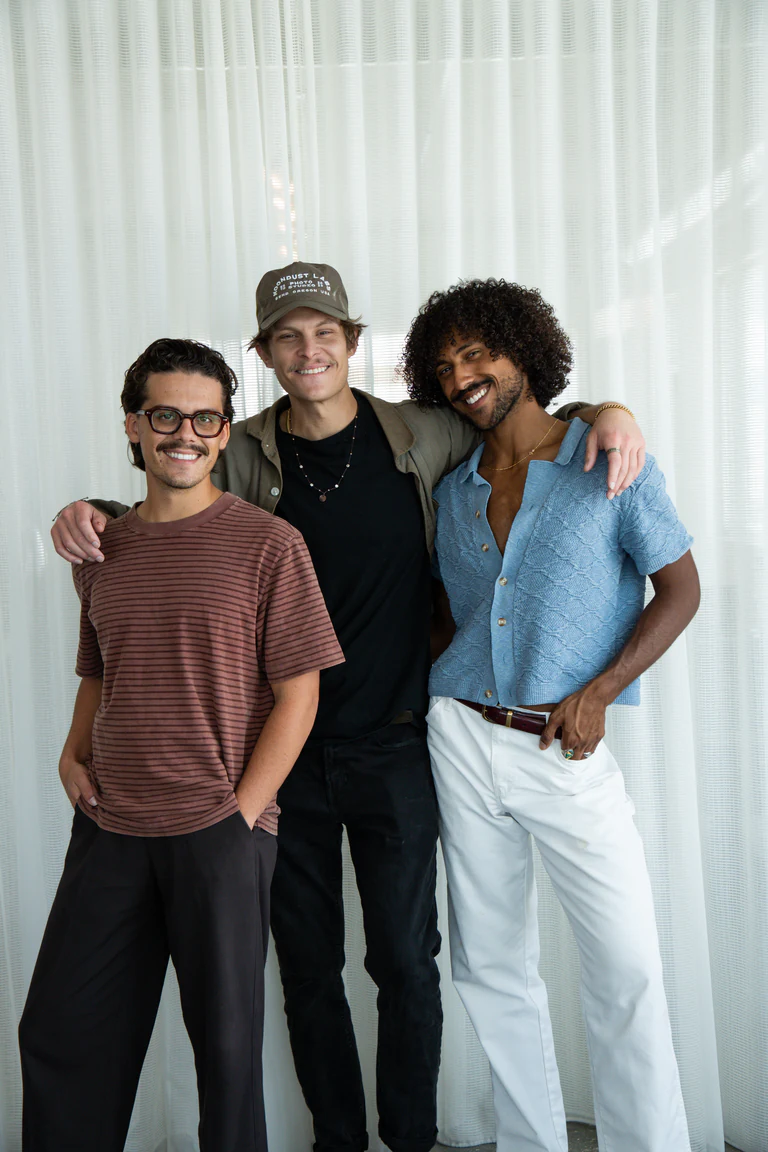 Full-length portrait of Chase Shelly, Ryan Hoebbel and Nelson Rivera of New Society Media