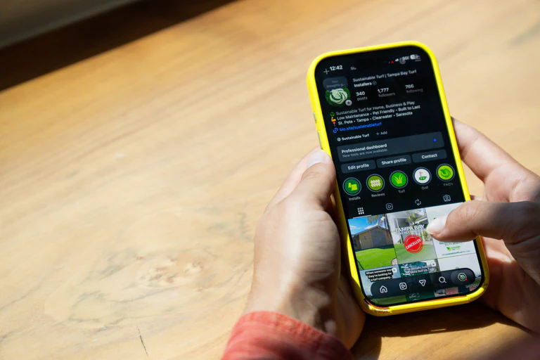 Sustainable Turf's Instagram profile, a New Society Media client, open on a phone